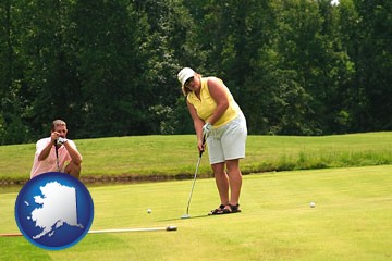 a golf putting lesson on a golf course - with Alaska icon