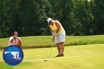 a golf putting lesson on a golf course - with Maryland icon