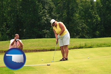 a golf putting lesson on a golf course - with Oklahoma icon