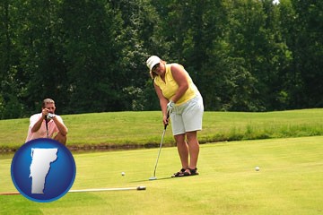 a golf putting lesson on a golf course - with Vermont icon